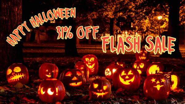 Many carved, glowing pumpkins on a lawn with fallen leaves at night, with the text "Happy Halloween - 31% off flash sale"