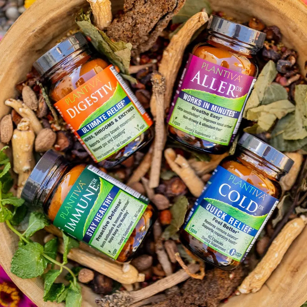 Bottles of Plantiva products with roots, seeds and leaves