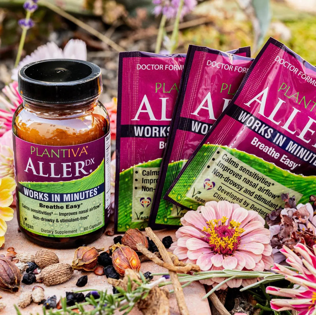 Plantiva Aller Dx supplement bottle and packets with flowers and other botanicals