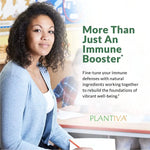 Woman sitting at a desk with text about ImmuneDx.